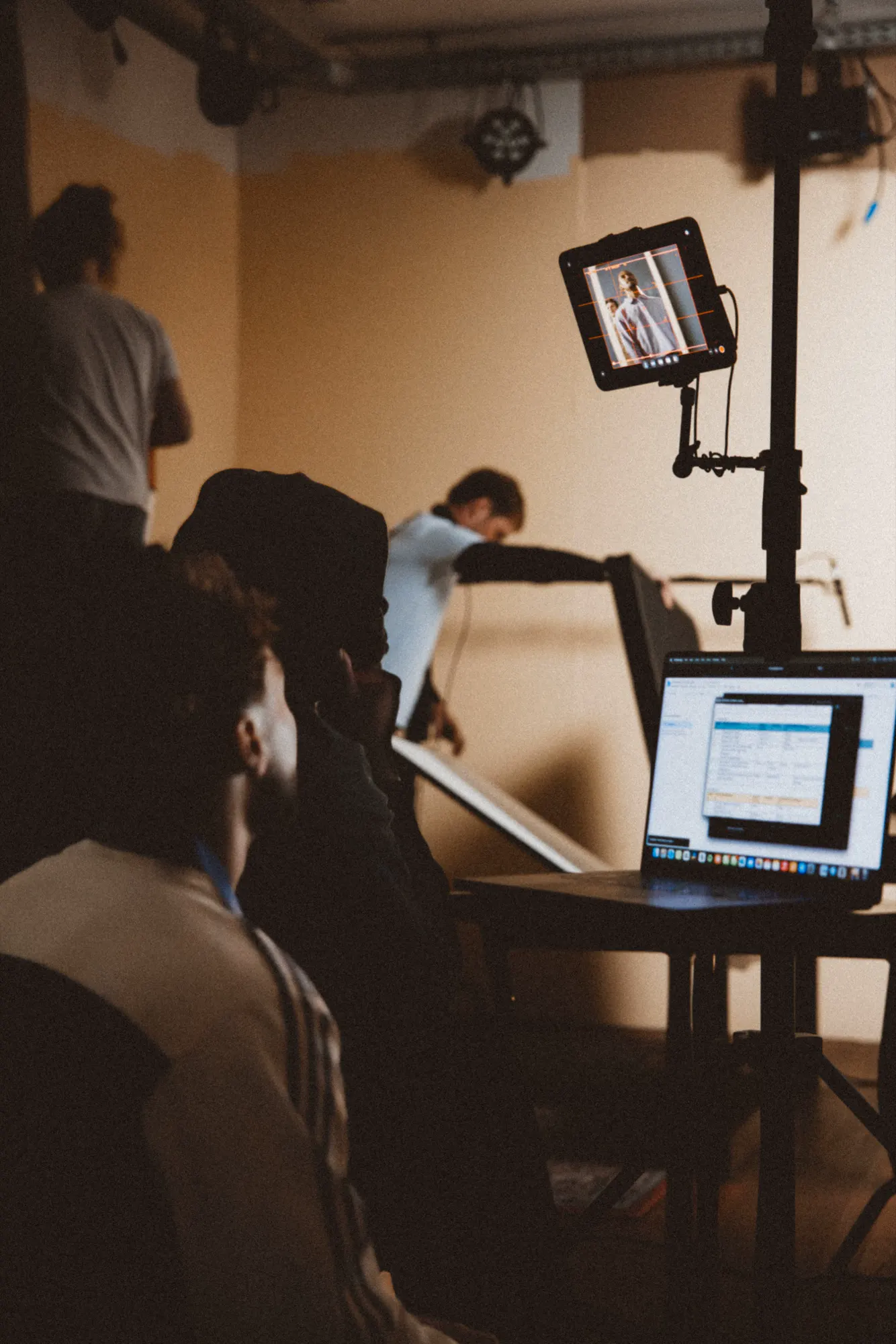 Checking the image on the laptop in the studio