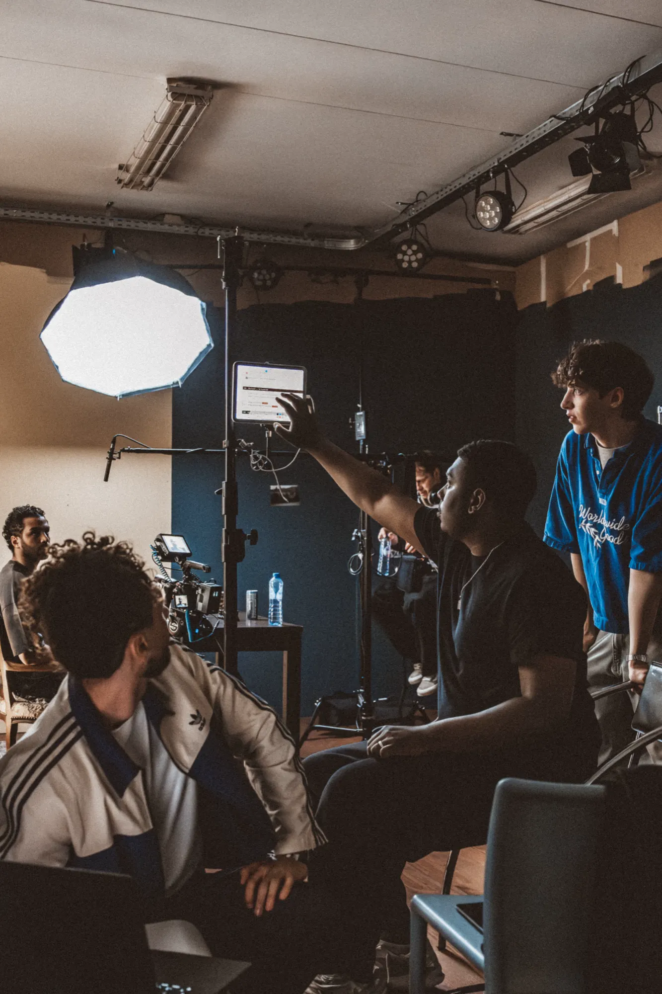 The crew in the studio, camera and lights ready