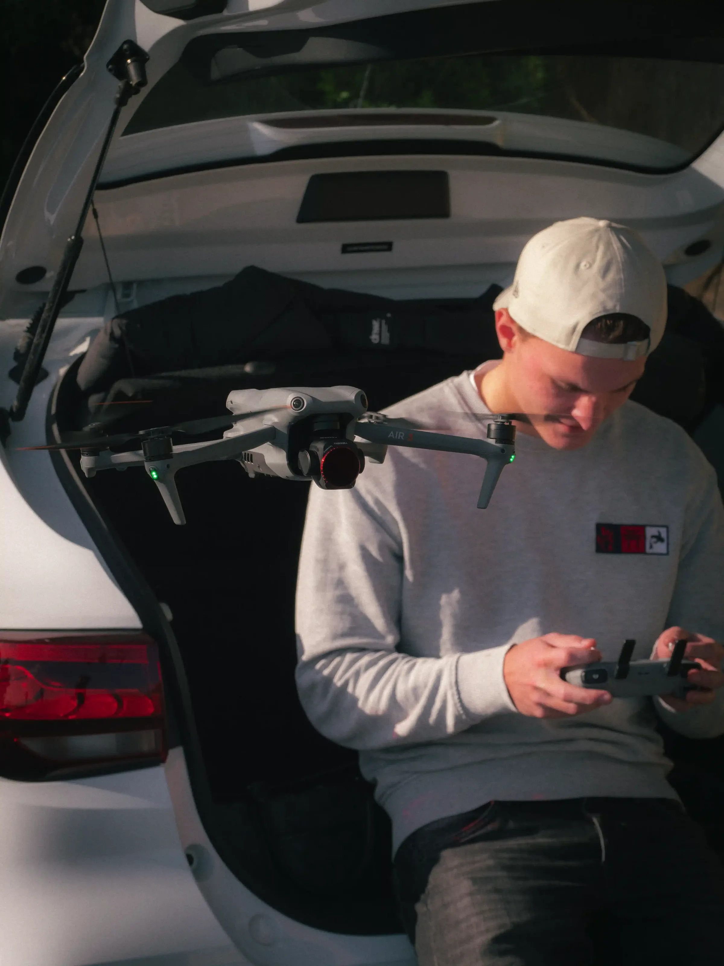 Preparing the drone from the boot of the car