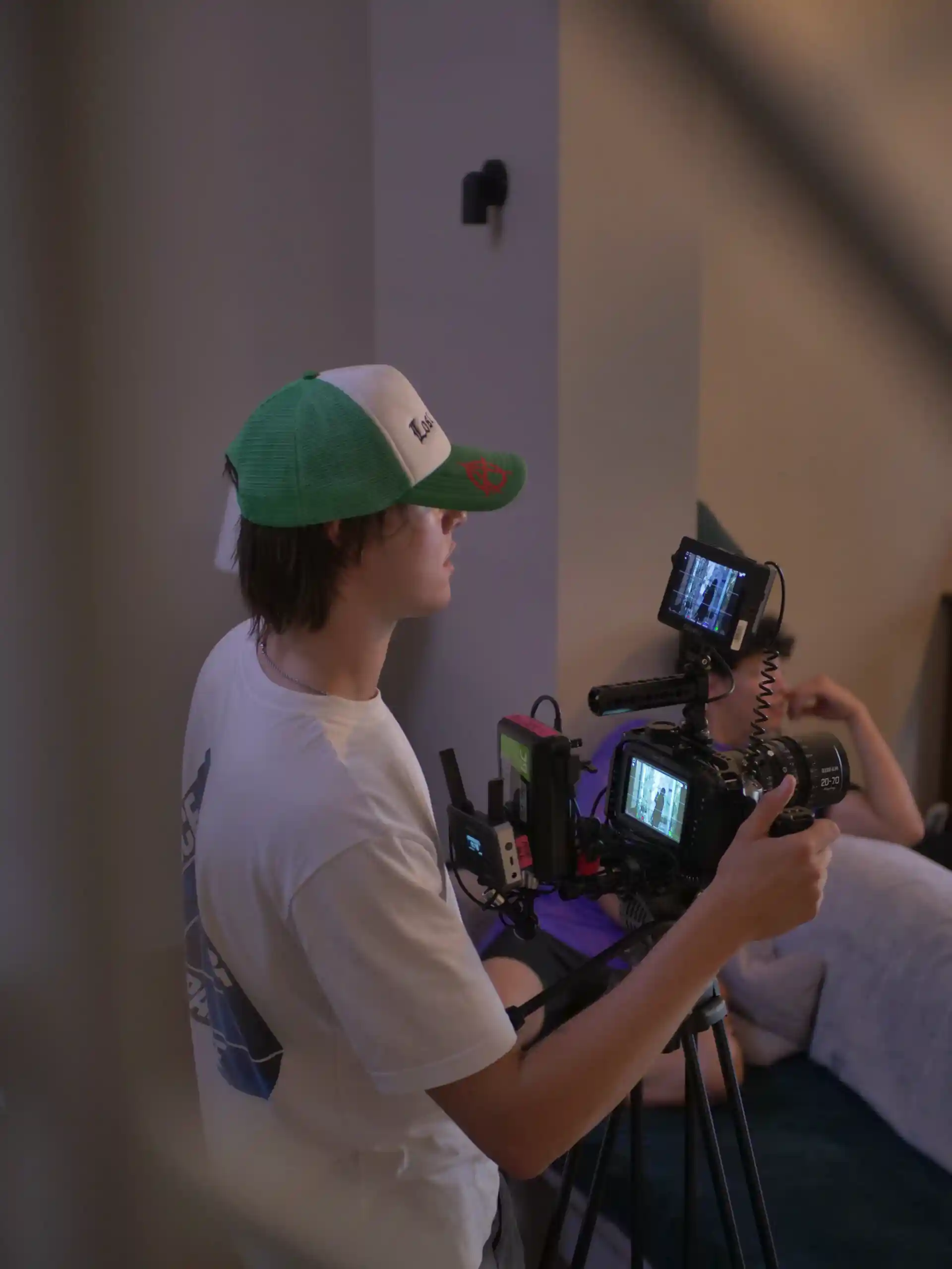 Camera operator checking the monitor during a shoot